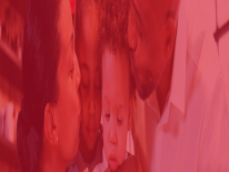 Mother and father kissing their children